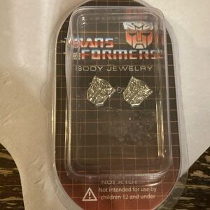 2012 Transformers pierced earrings silvertone new in packaging